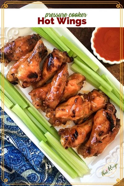 buffalo hot wings on a tray with celery