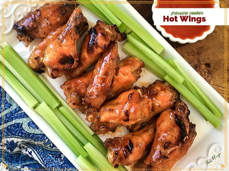 buffalo hot wings on a tray with celery