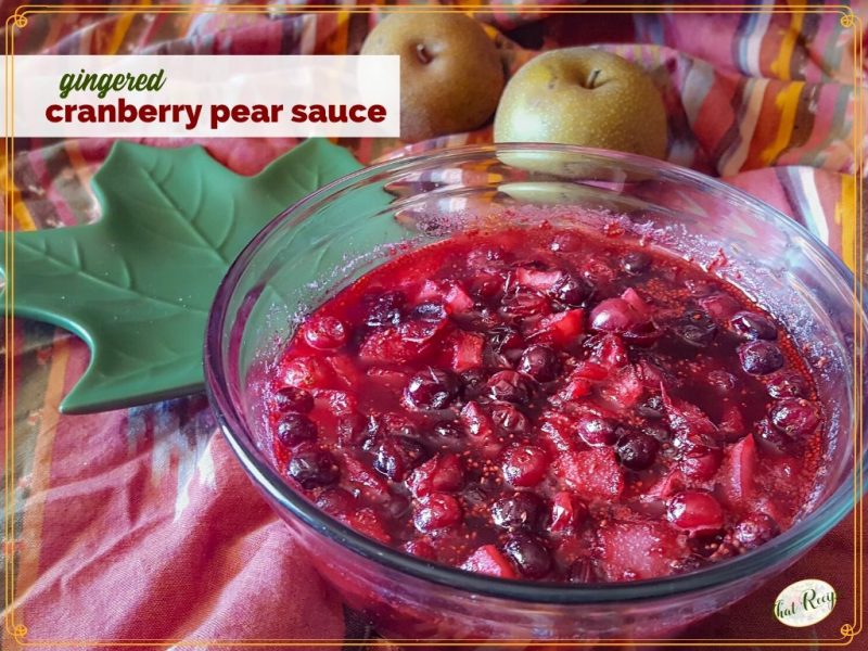bowl of cranberry sauce with text overlay gingered cranberry pear sauce