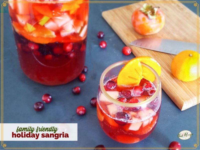 glass of virgin mocktail with text overlay "family friendly holiday sangria"