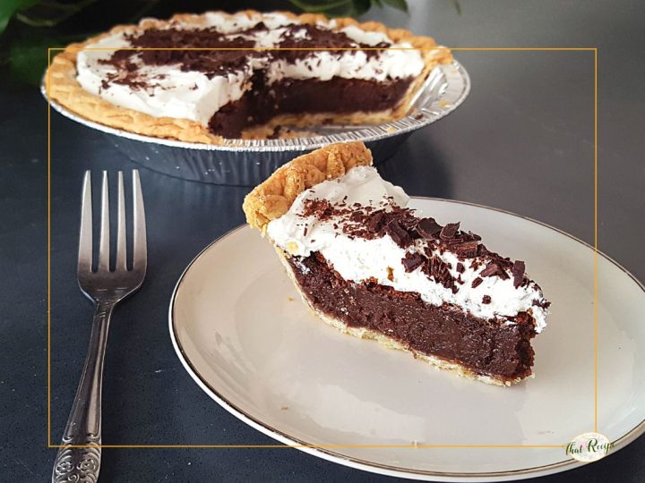 slice of chocolate pie with whipped cream on a plate