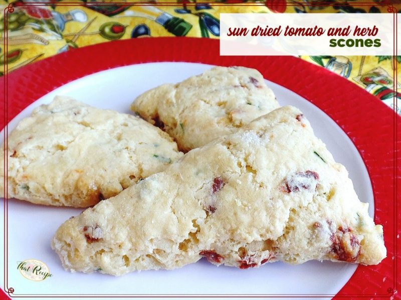 sun dried tomato and herb scones on a plate