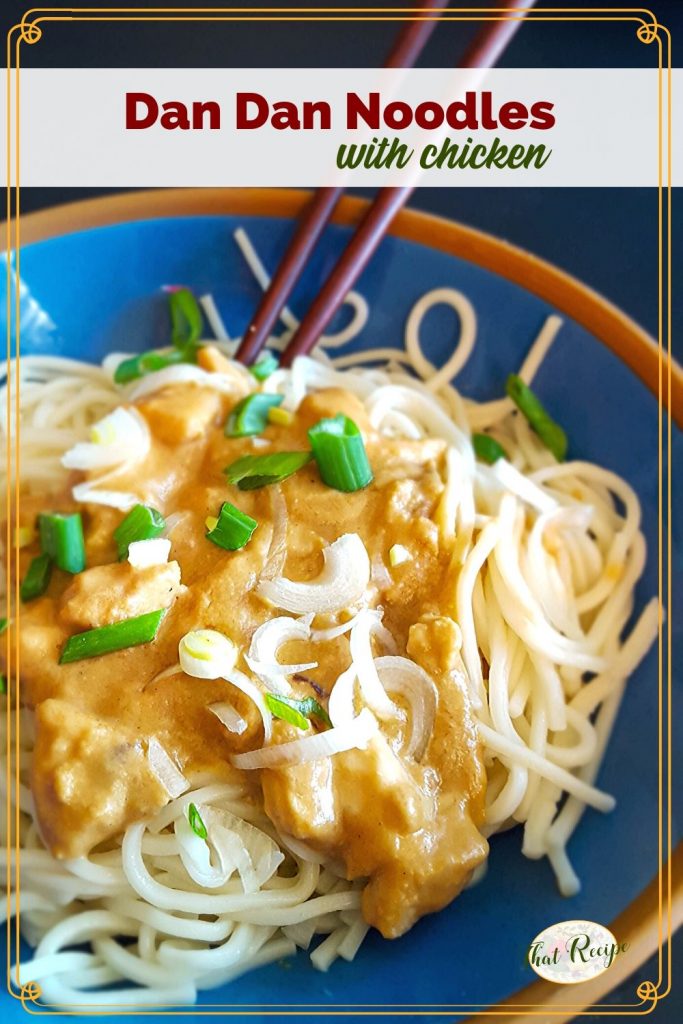 bowl of chicken and sauce over noodles with text overlay "Dan Dan Noodles with chicken"