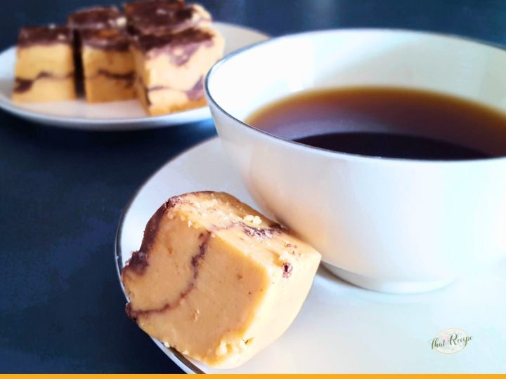 peanut butter chocolate fudge with a cup of coffee