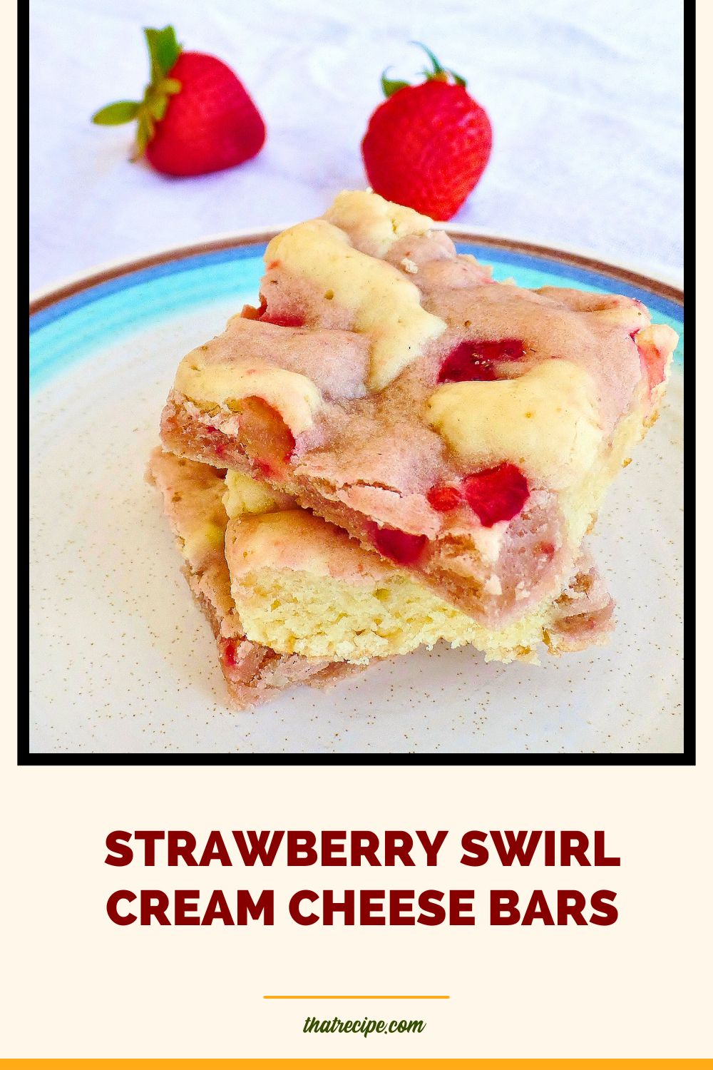 strawberry cream cheese swirl cookie bars on a plate
