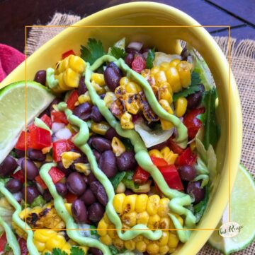 southwestern salad with lettuce, grilled corn, black beans, bell pepper and an avocado dressing