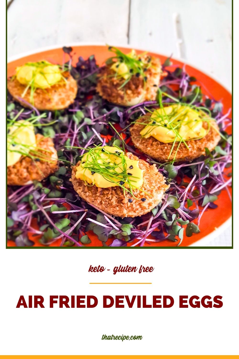 fried deviled eggs on bed of microgreens with text overlay "keto air fried deviled eggs"