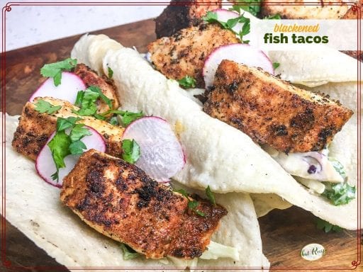 fish tacos with sauce and radish slices with text overlay "blackened fish tacos"