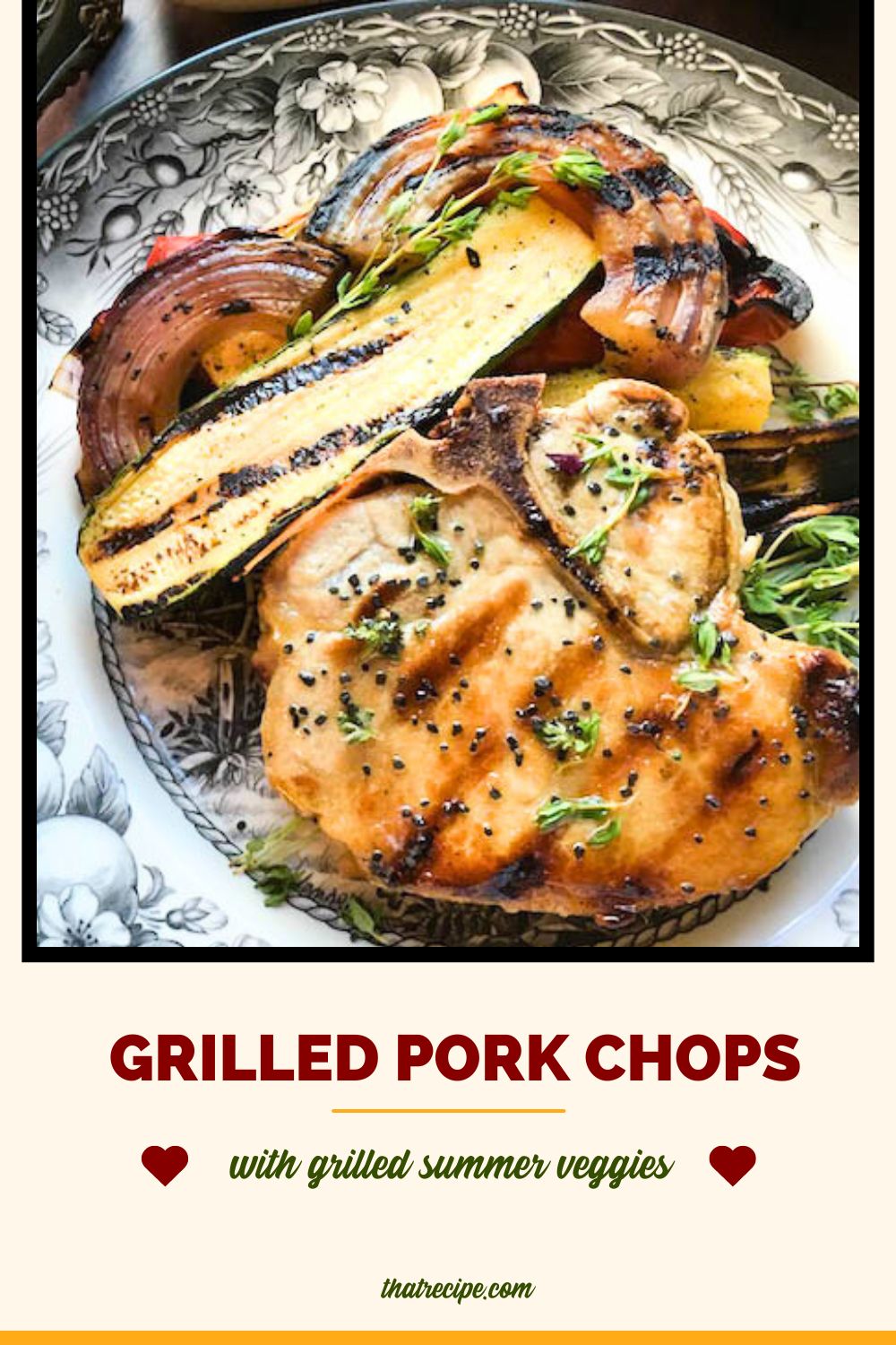 grilled pork chop and vegetables on a plate