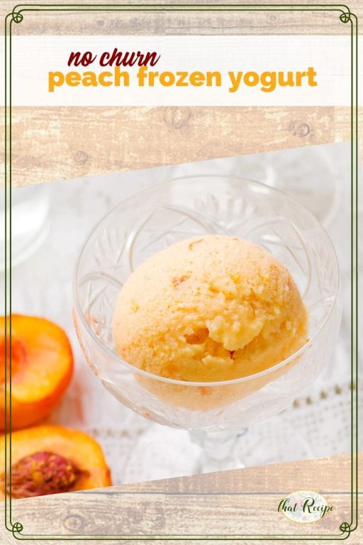 peach yogurt in a glass dish with cut fresh peach next to it and text overlay "no churn peach frozen yogurt"