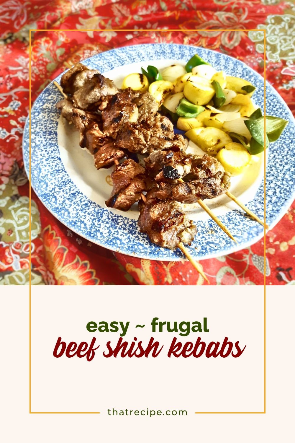 grilled beef shish kebabs on a plate with grilled vegetables