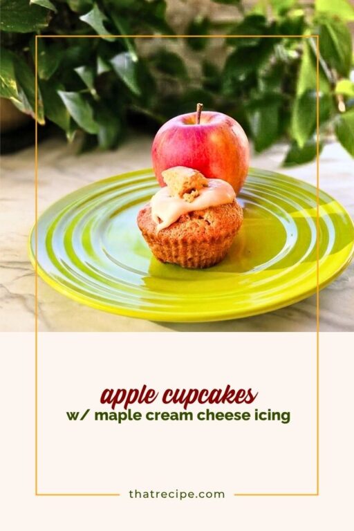 apple cupcake on a plate with an apple