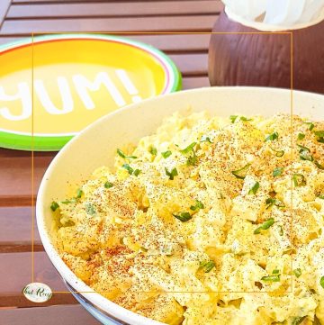 bowl of potato salad on a picnic table