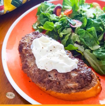 open faced burger on a plate with a green salad and text overlay "Open Faced burgers"