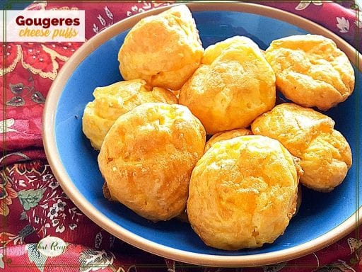 plate of cheese puffs with text overlay "Gougeres cheese puffs"