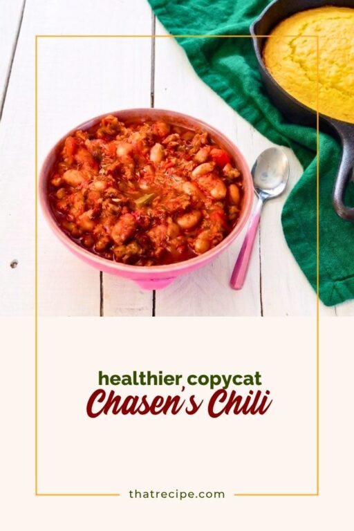 bowl of chili in front of pan of cornbread
