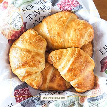 top down view of croissants in a basket