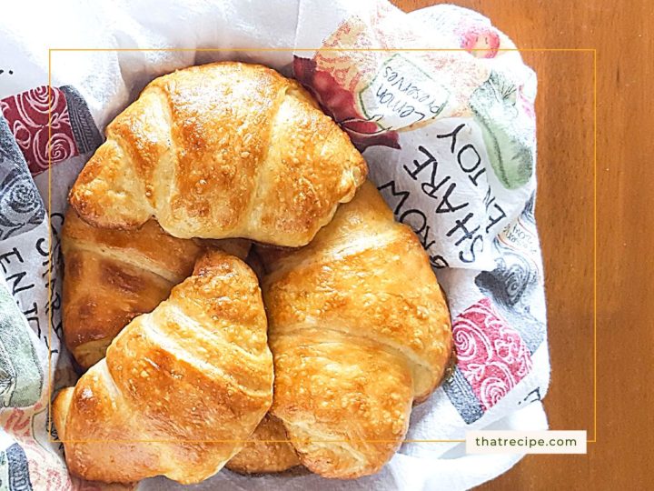 top down view of croissants in a basket