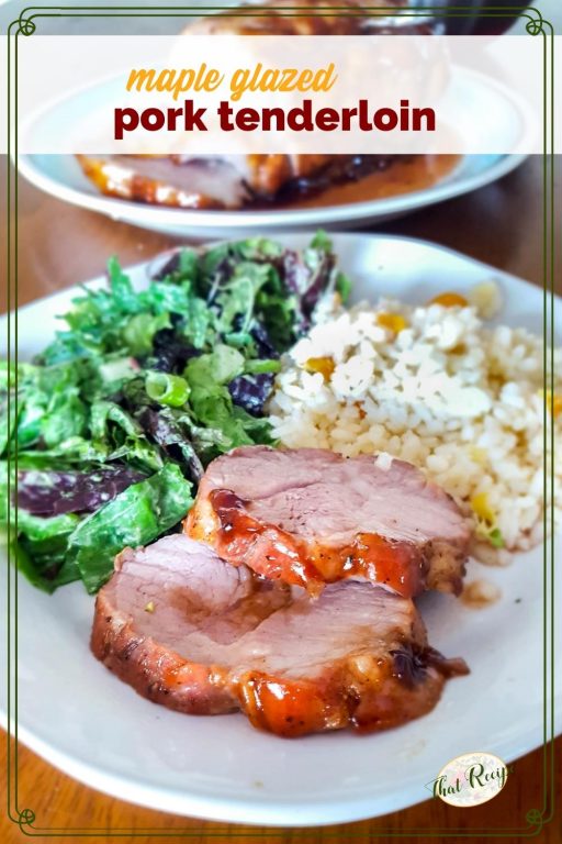 plate with pork tenderloin, brown rice and salad with text overlay "maple glazed pork tenderloin"