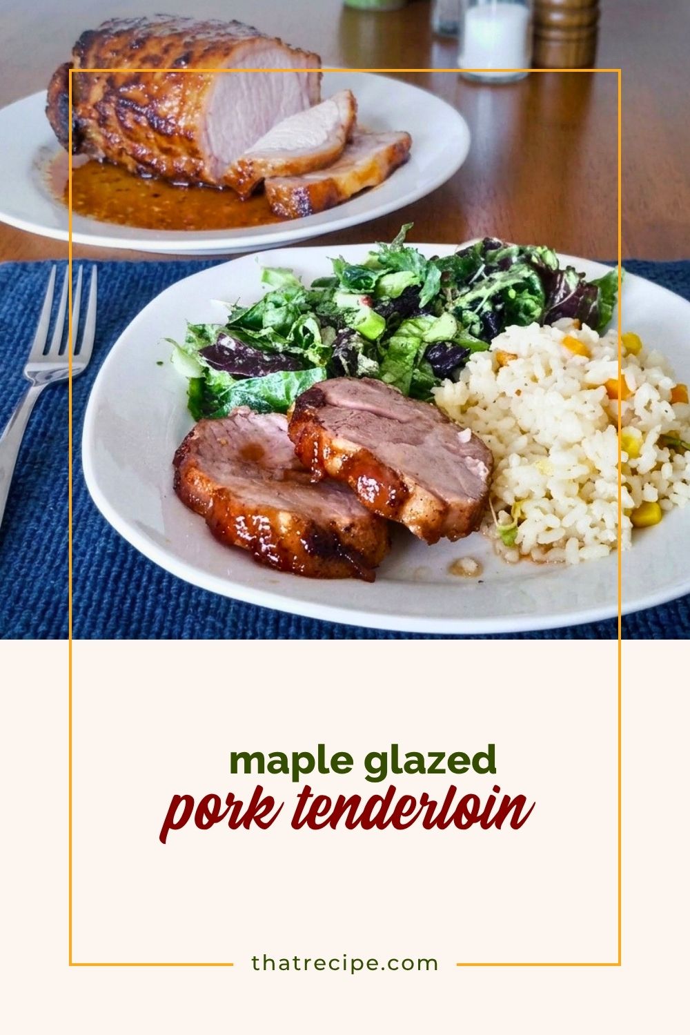 plate with pork tenderloin, brown rice and salad