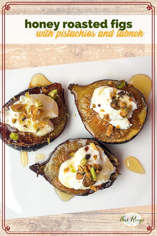 top down view of figs topped with cheese and nuts and text overlay "honey roasted figs with pistachios and labneh"