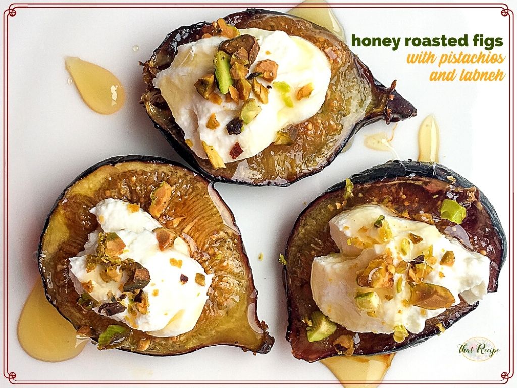 top down view of figs topped with cheese and nuts and text overlay "honey roasted figs with pistachios and labneh"