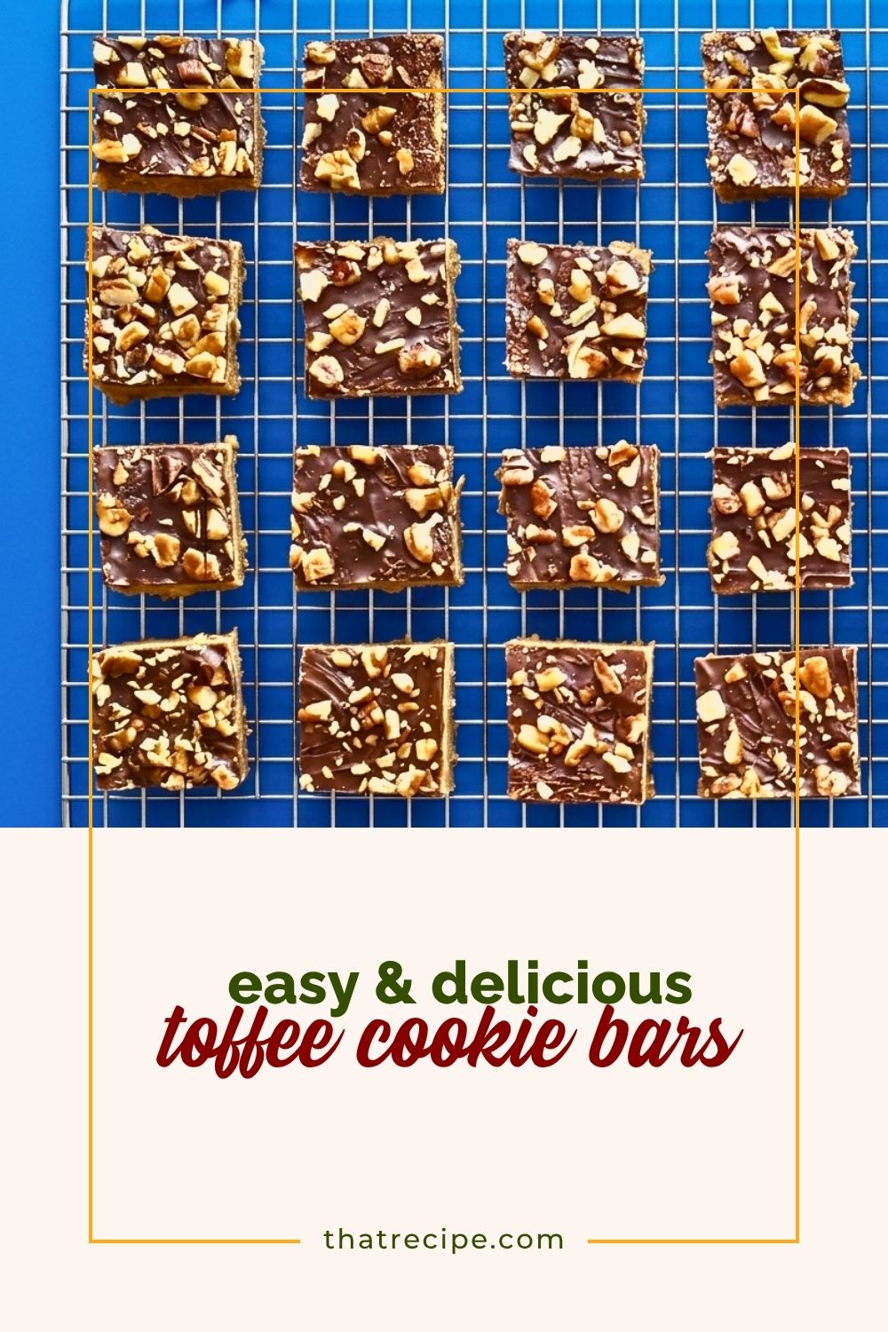 chocolate and nut topped cookie bars on a cooling rack
