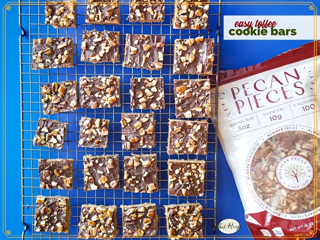 cookies on a cooling rack with bag of pecans and text overlay "easy toffee cookie bars"