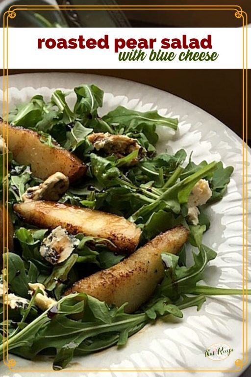 roasted pears on arugula with text overlay "roasted Pear Salad with blue cheese"