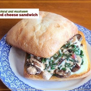 sandwich on a plate with text overlay "chard and mushroom toasted cheese sandwich"