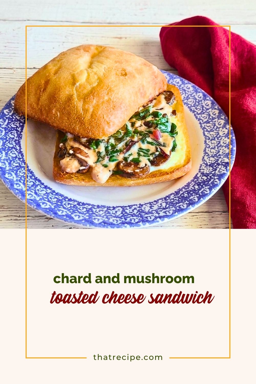 Grilled cheese sandwich made with chard and mushrooms on a ciabatta roll.