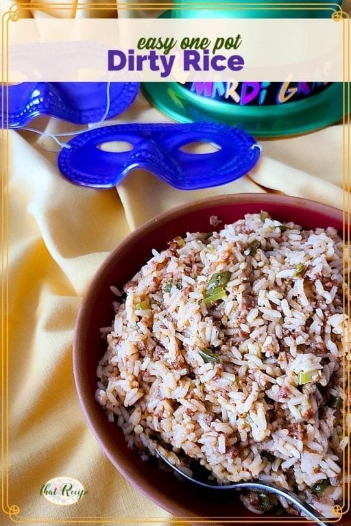 rice in a bowl with mardi gras masks and hat and text overlay "easy one pot dirty rice"