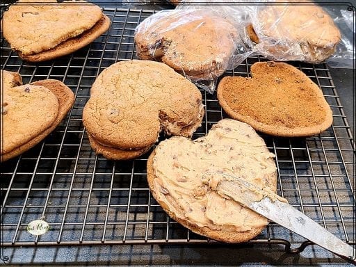 heart shaped cookies spread with brown sugar frosting