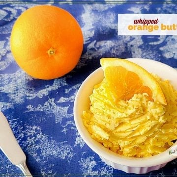 orange butter in a dish with text overlay "whipped orange butter"