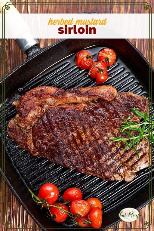 sirloin steak and tomatoes on a cast iron griddle with text overlay "herbed mustard sirloin"