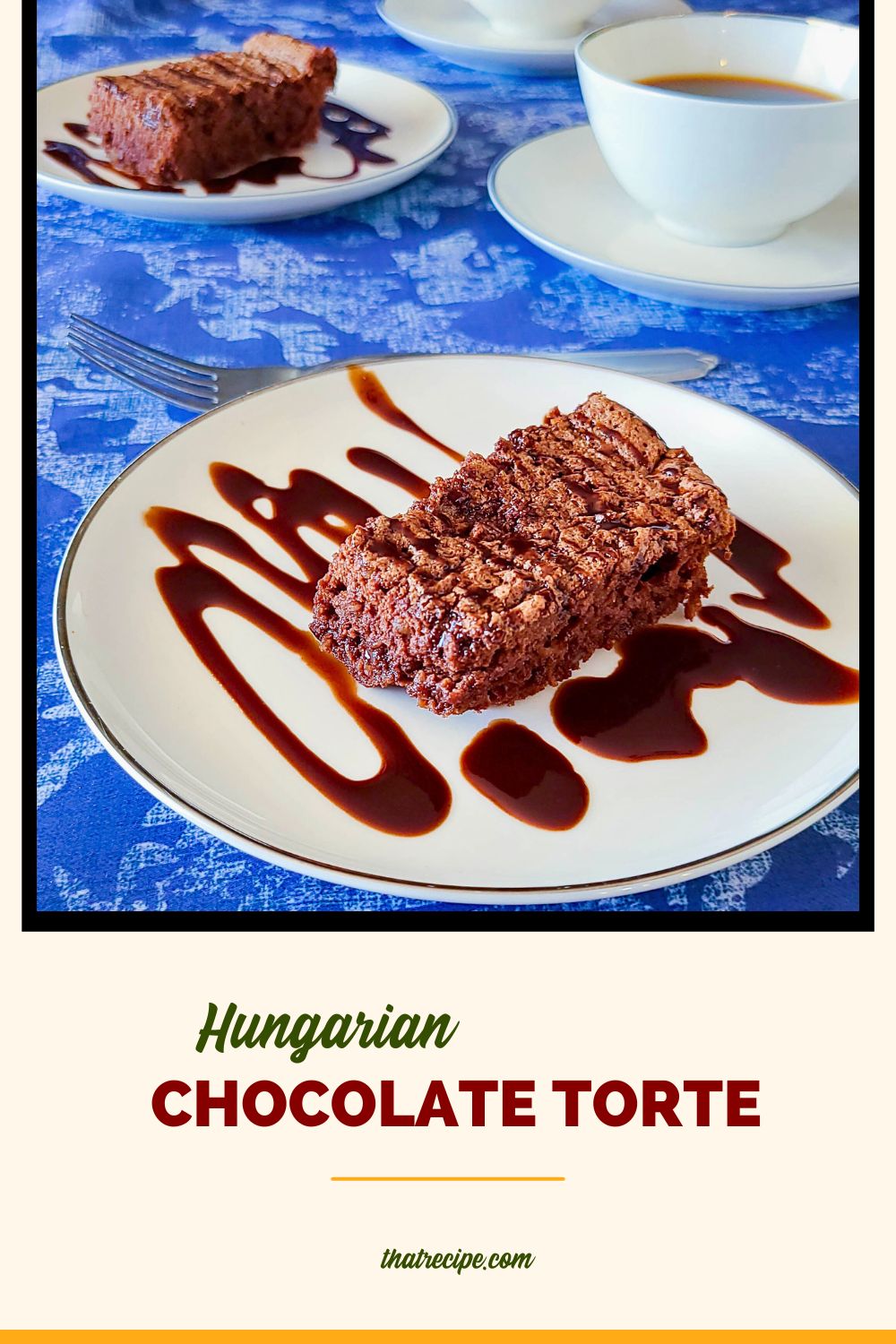 slice of chocolate torte on a plate drizzled in chocolate sauce with text overlay "Hungarian chocolate torte"
