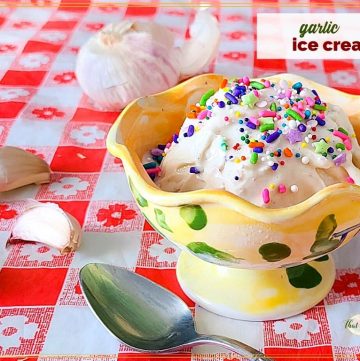 ice cream topped with sprinkles surrounded by garlic cloves and text overlay "garlic ice cream"