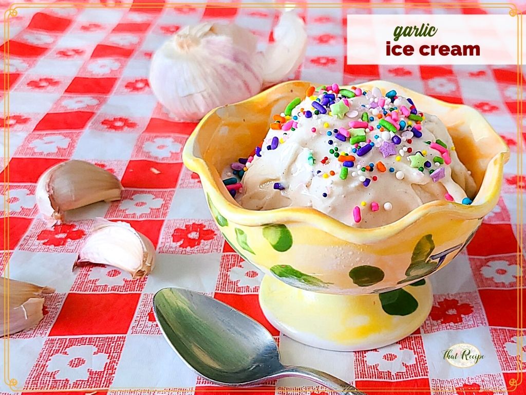 ice cream topped with sprinkles surrounded by garlic cloves and text overlay "garlic ice cream"