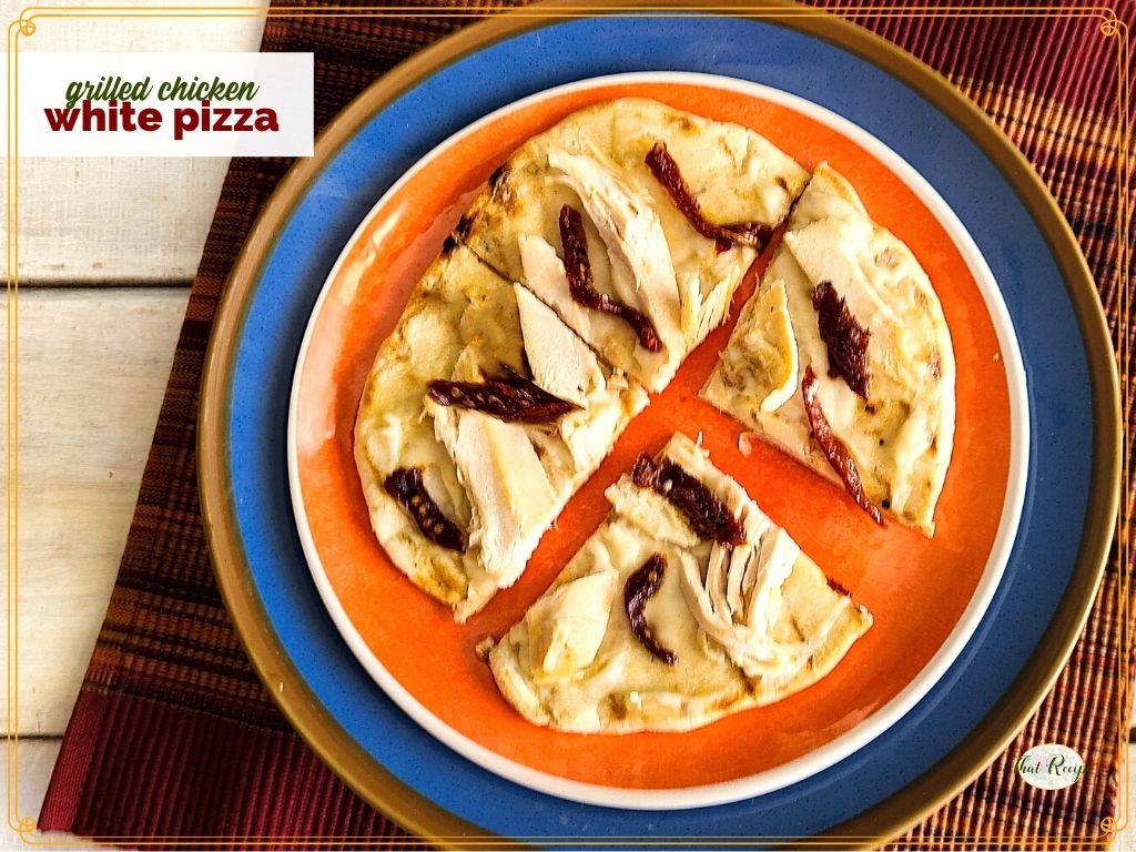 white pizza on a plate with text overlay "grilled chicken white pizza"