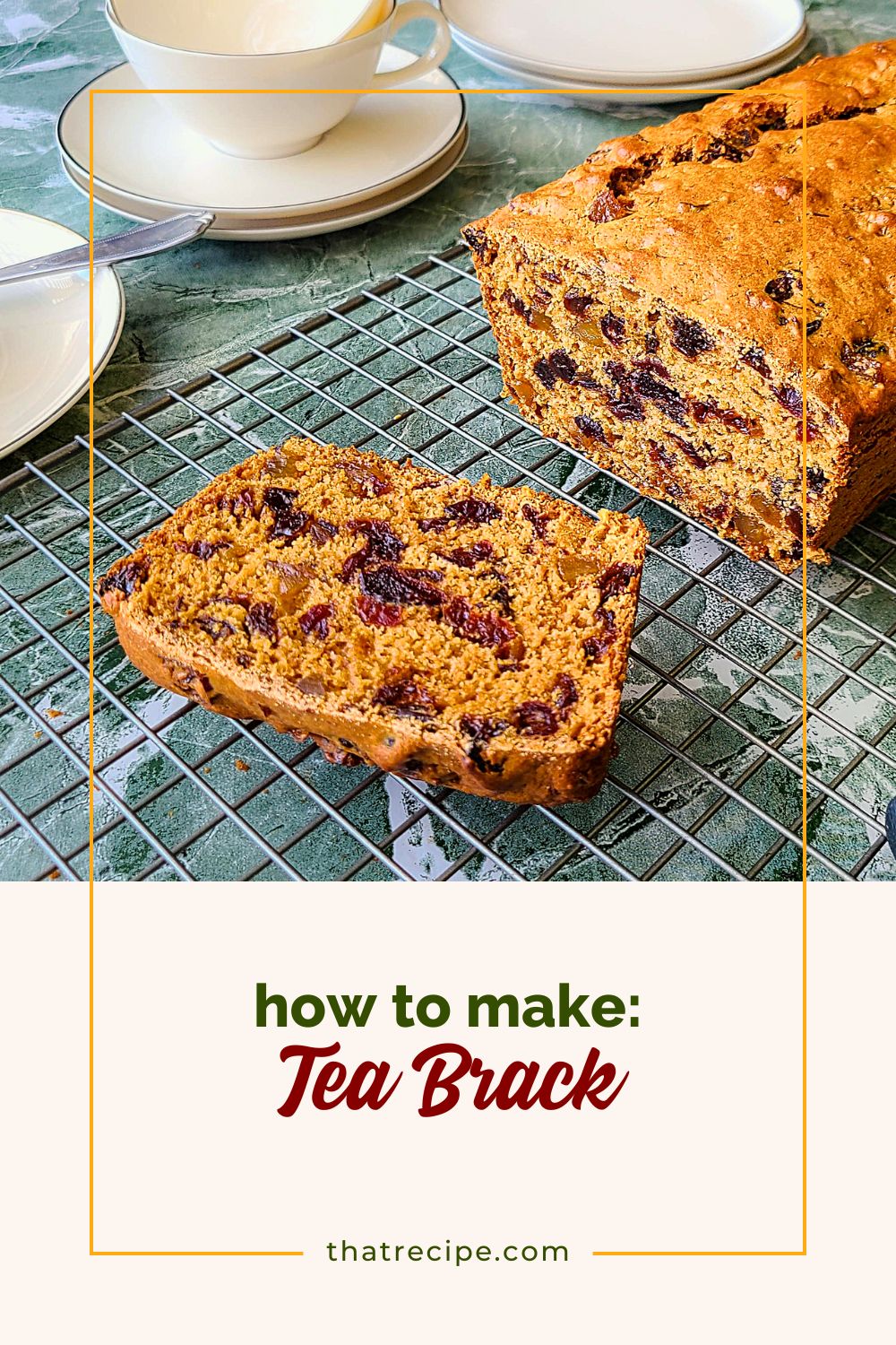 loaf of fruit bread on a cooling rack with text overlay "Tea Brack"