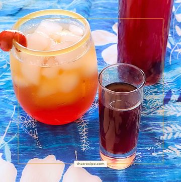 cherry brandy in a shot glass, in a mixed drink and in a bottle