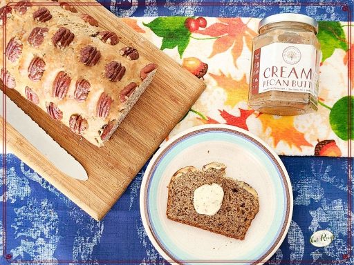 pecan bread with butter on table and text overlay " pecan butter bread with apple cider butter"