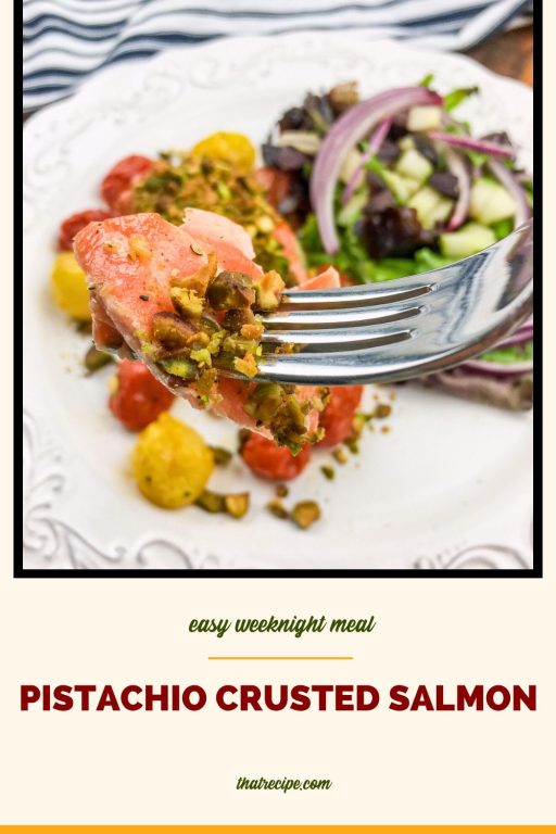 fork holding a piece of pistachio covered salmon with text overlay "pistachio crusted salmon"