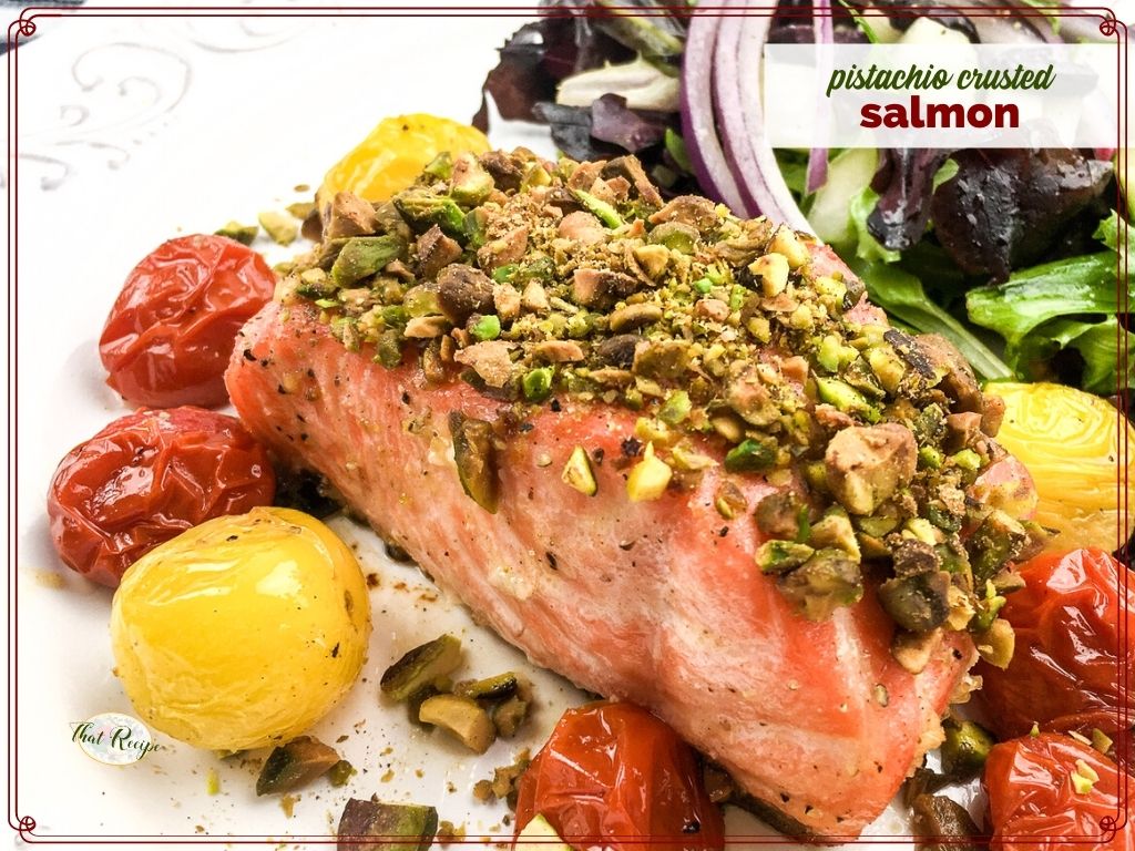 piece of salmon covered with chopped pistachios with text overlay "pistachio crusted salmon"