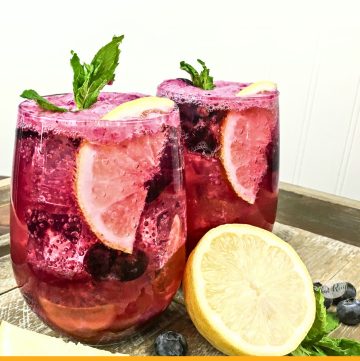 glasses of lemon blueberry punch with text overlay "sparkling lemon blueberry mocktail"