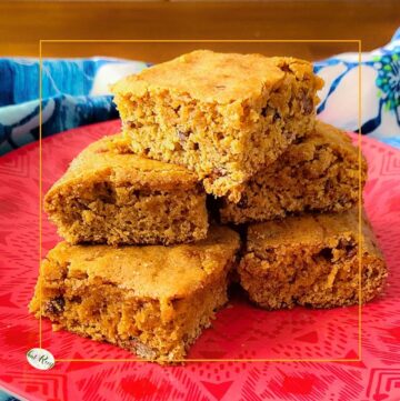 butterscotch pecan blondies stacked on a plate