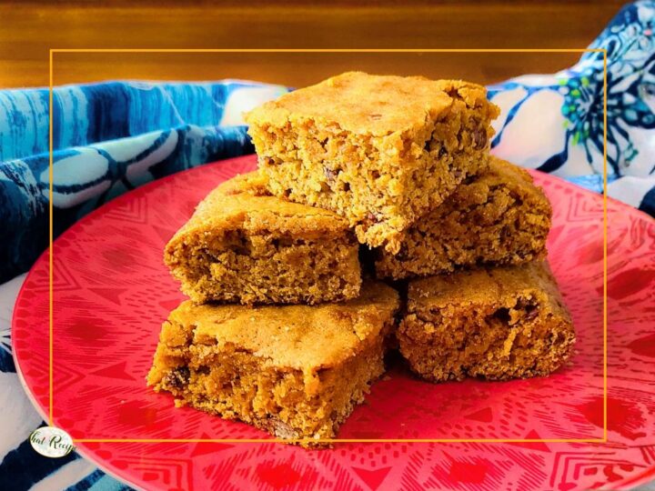 butterscotch pecan blondies stacked on a plate