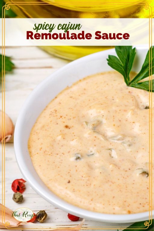 remoulade sauce in a white bowl with text overlay "Spicy Cajun Remoulade Sauce"