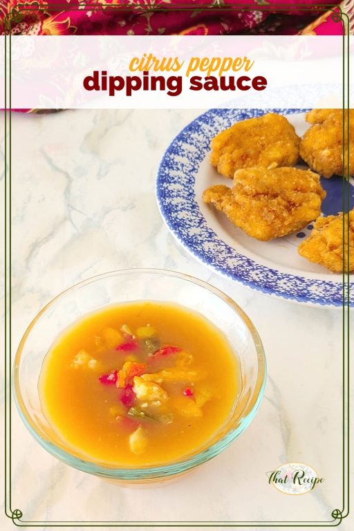 bowl of orange sauce with text overlay "citrus pepper dipping sauce"