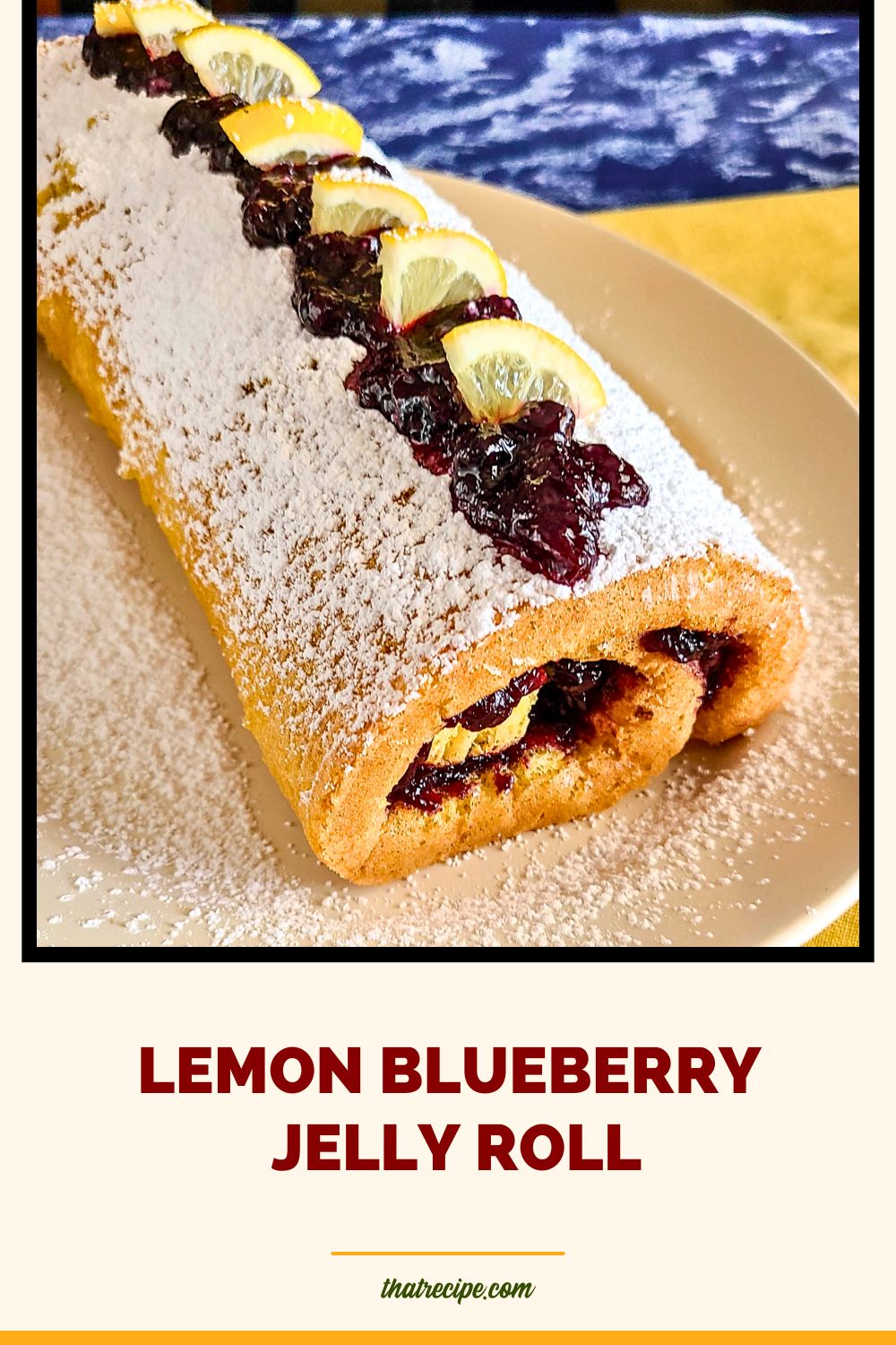 lemon blueberry jelly roll cake on a plate
